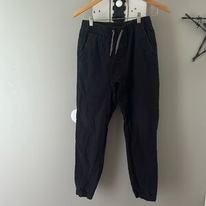 Boys jogger style black pants with elastic waist.